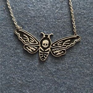 Silver Moth Pendant Necklace with Intricate Wing Details